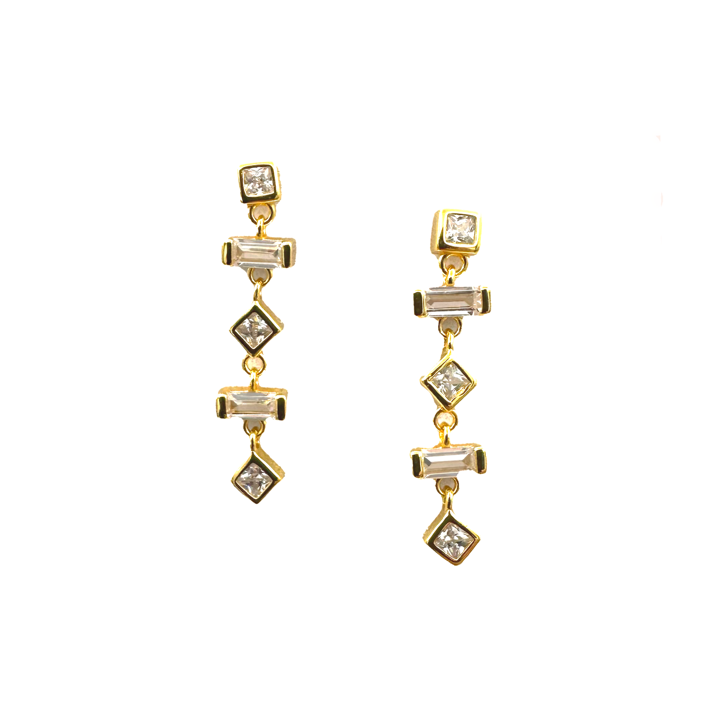 Pair of gold-plated sterling silver dangle earrings with white cubic zirconia. There are 5 bead like elements that make up each earring. The top element is a square bezel set cubic zirconia. The second and fourth elements are baguette-shaped cubic zirconia. Elements 3 and 5 are diamond shaped cubic zirconia. The earrings are floating against a white background.