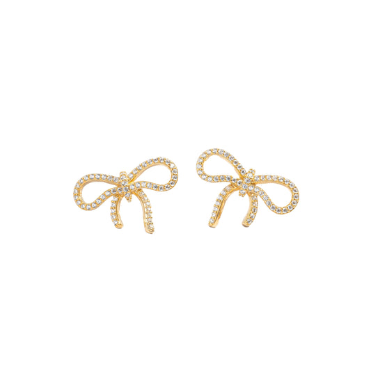 Gold-plated sterling silver stud earrings in the shape of a bow set against a white background. Each bow is lined with pave-set white cubic zirconia.