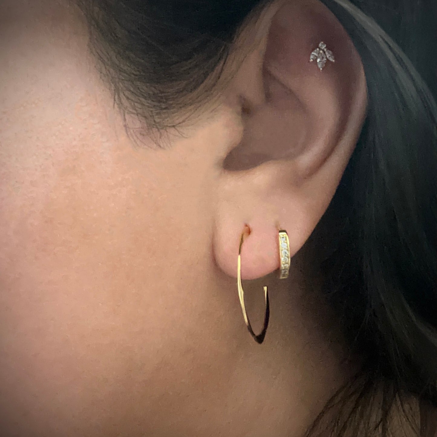 Gold Chic Pave Cubic Ziconia Huggie Earrings in second lobe piercing